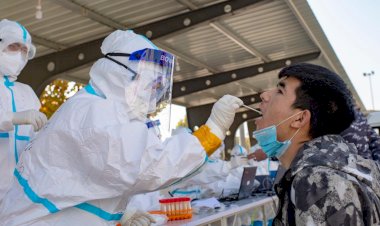 China tests millions after coronavirus flareups in 3 cities