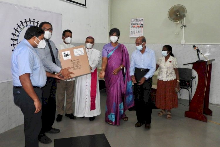 Sri Lankan Catholic Association NSW donating a Transport Ventilator